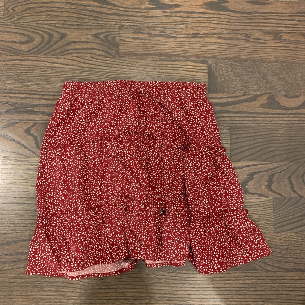 red and white flowery mini skirt